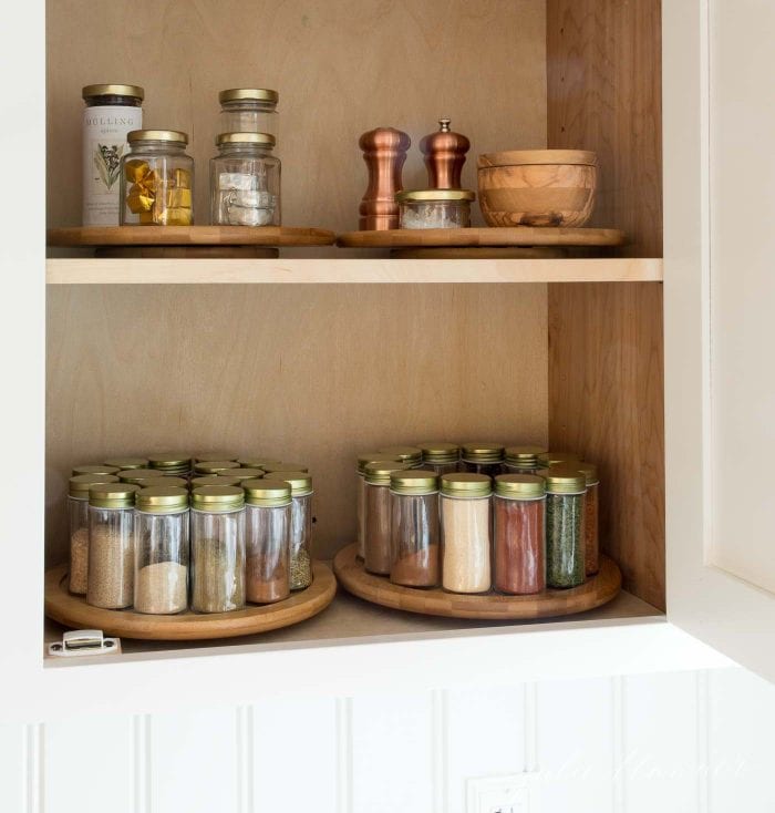 https://julieblanner.com/wp-content/uploads/2019/02/kitchen-organization-spice-cabinet-700x734.jpg