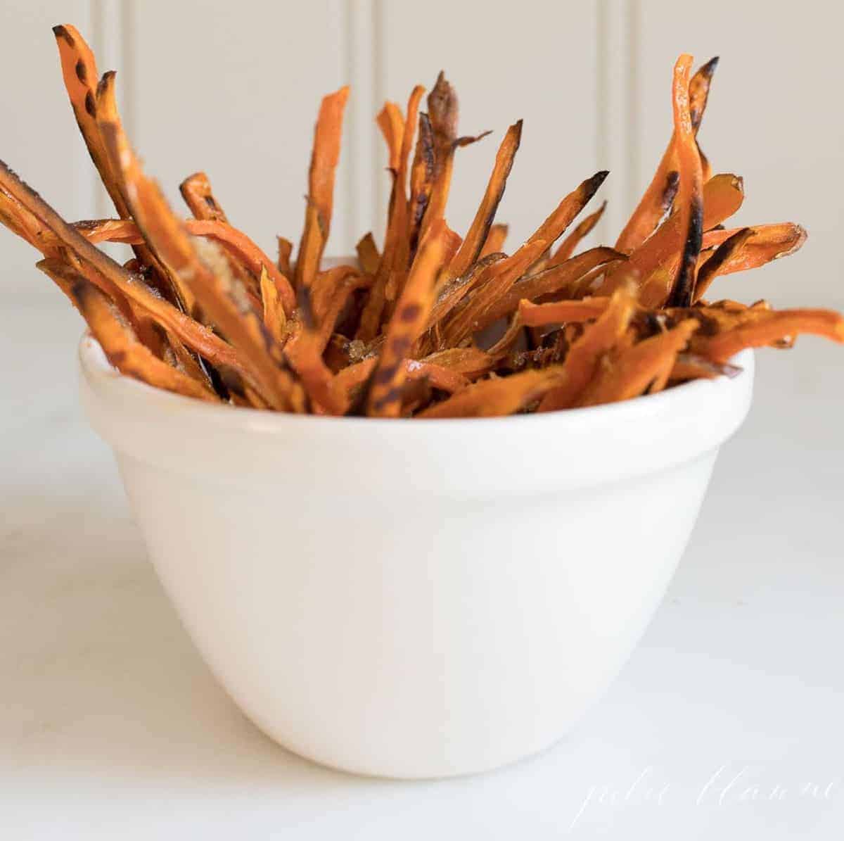 sweet potato fries in cream bowl