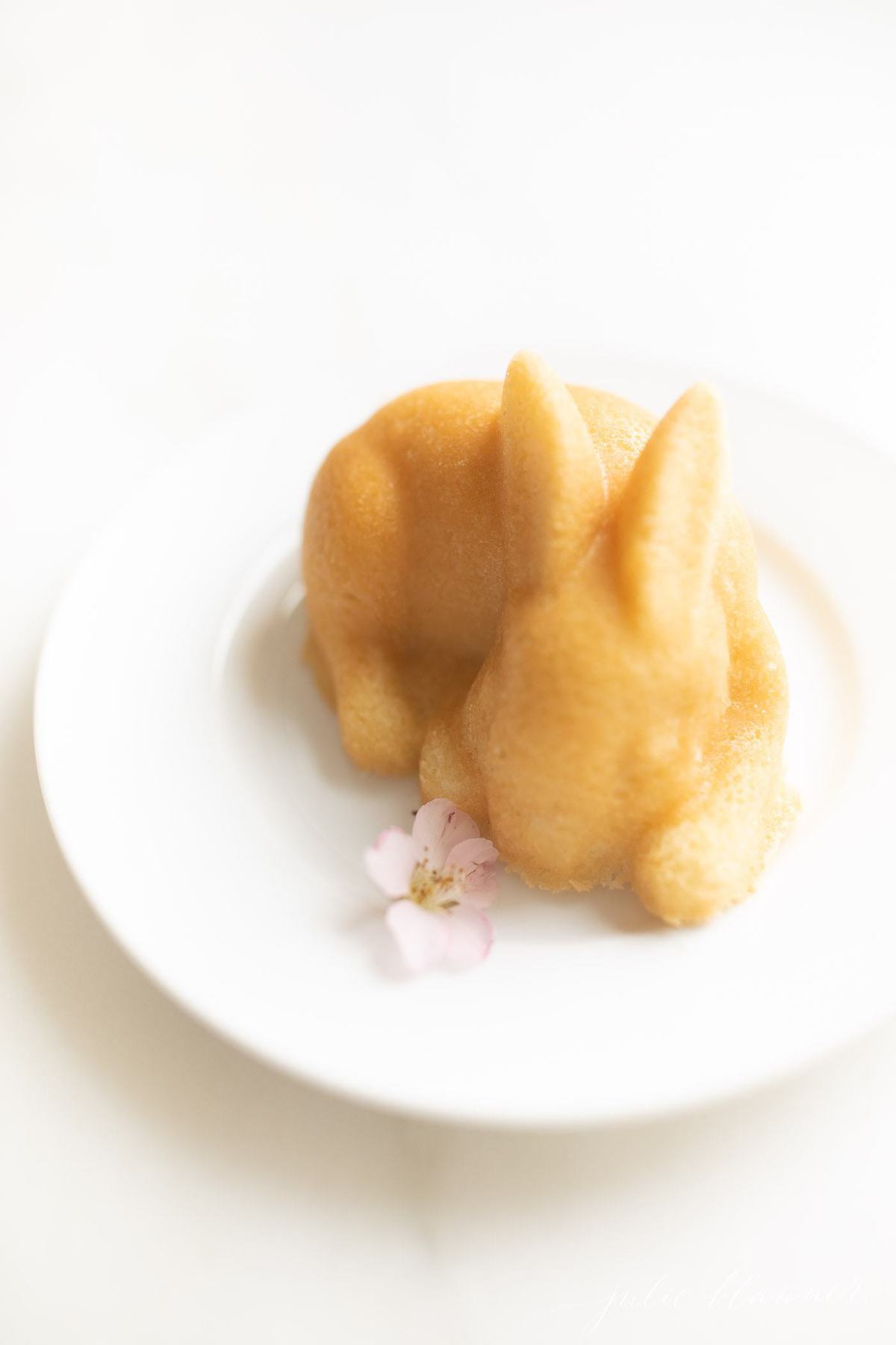 miniature easter bunny cake on a white plate
