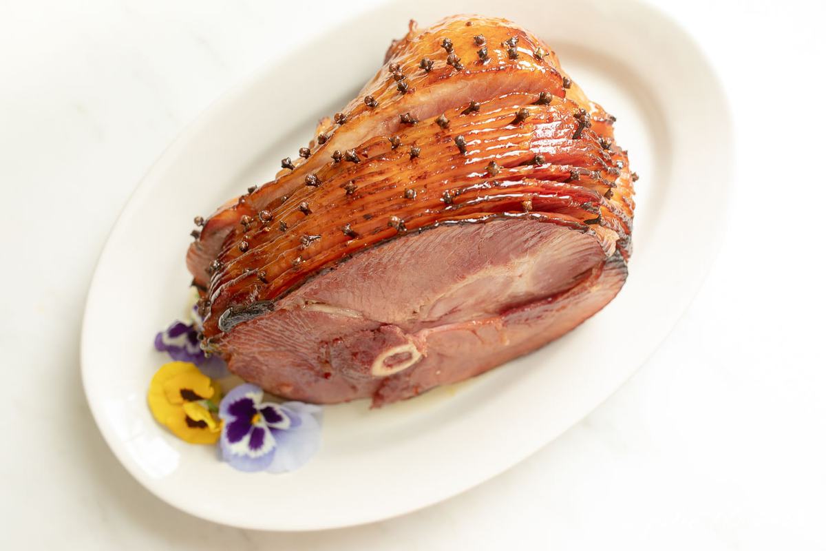 honey baked ham | spiral ham on a platter with cloves