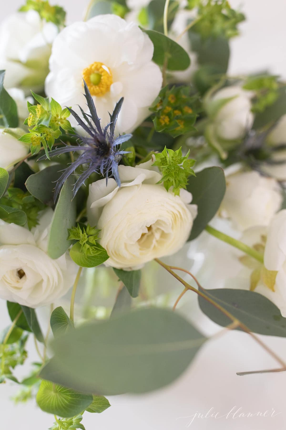 White Ranunculus flower centerpiece close up image