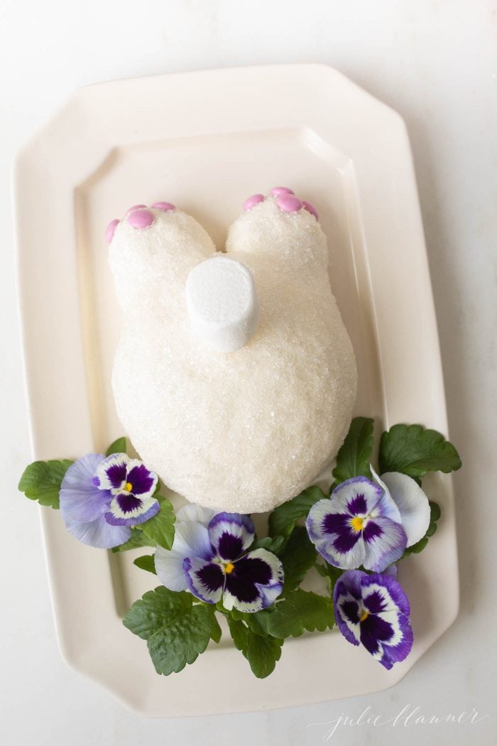 bunny digging in flowers