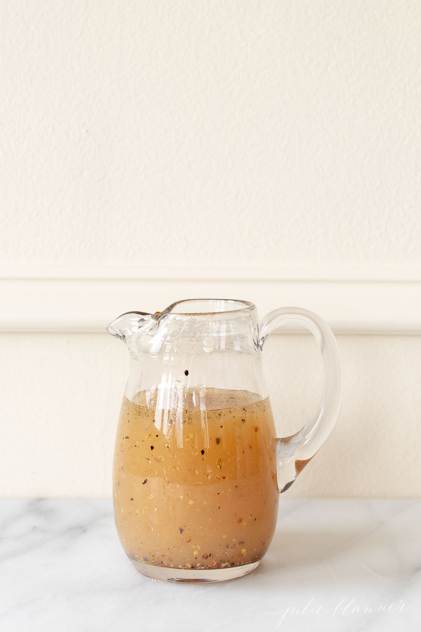 apple cider pasta salad dressing in pourable jar