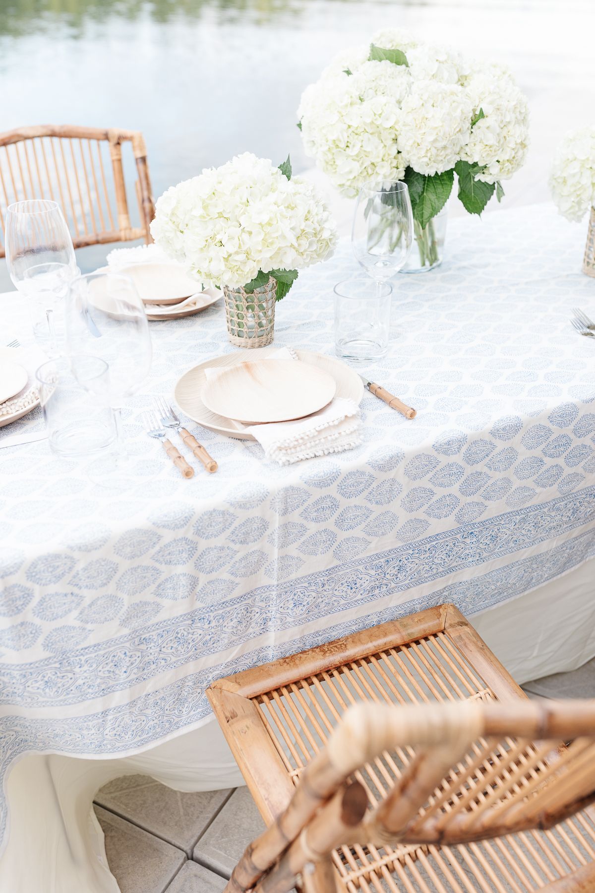 Mother's day brunch ideas with a table set with a blue and white tablecloth and bamboo accents