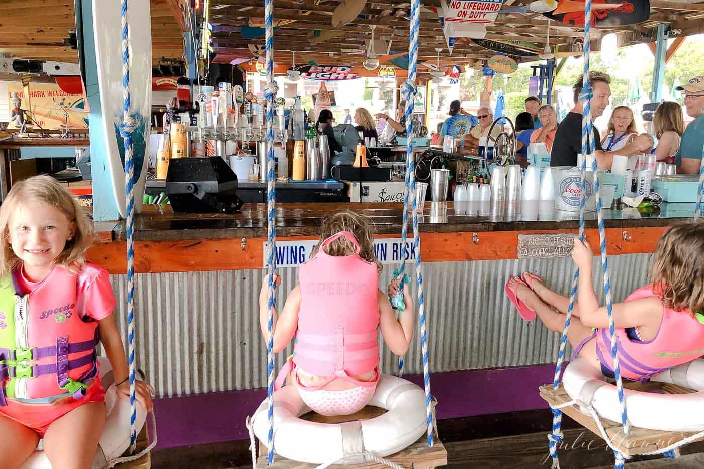 kids on life ring swings