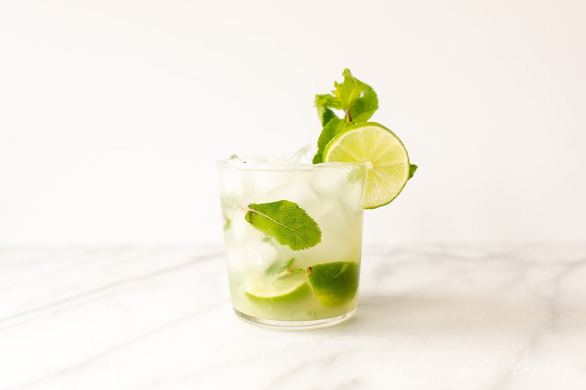 skinny mojito garnished with mint sprig and lime slice