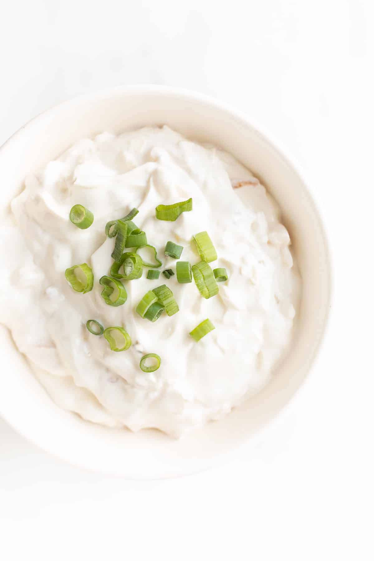 sour cream and onion dip in a bowl