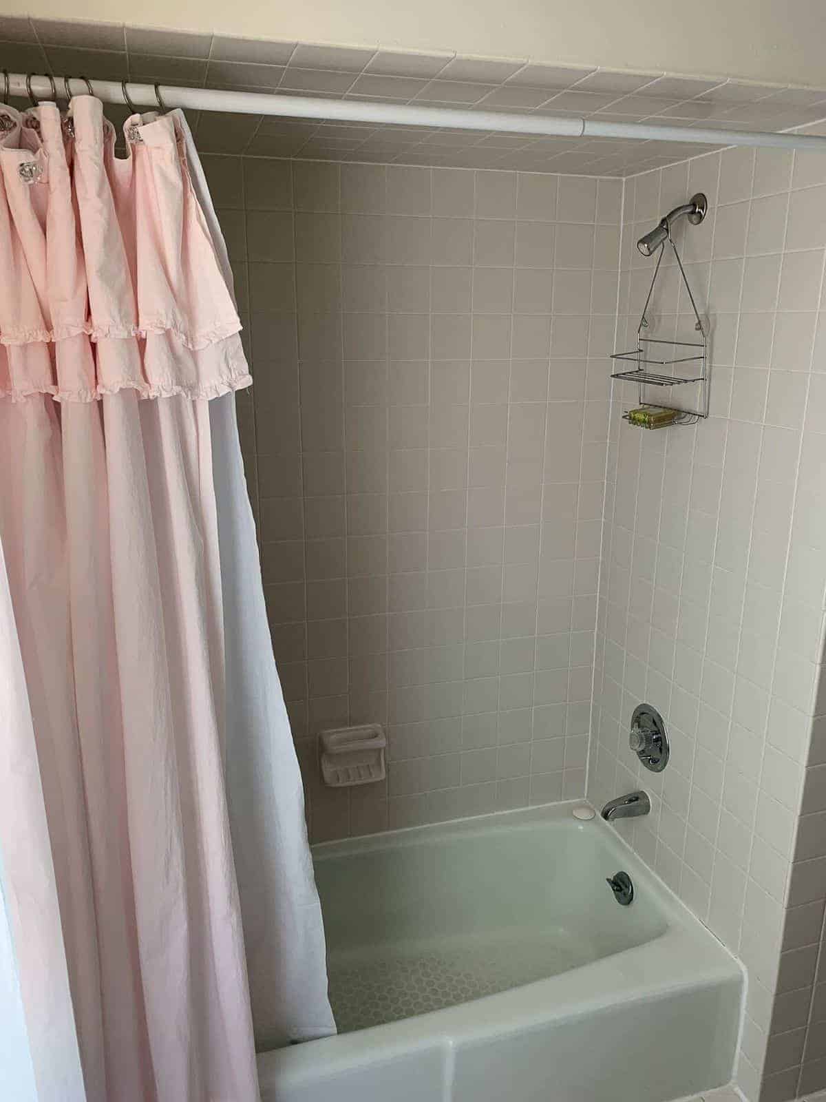 Dark and dated shower with low ceiling. #beforeandafter