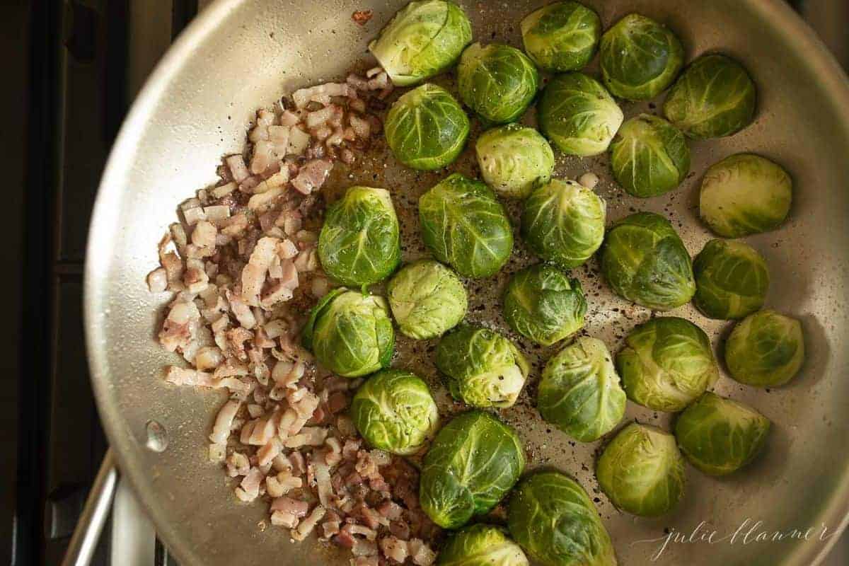 Aluminum pan on the stovetop, fresh pancetta and brussel sprouts waiting to be cooked.