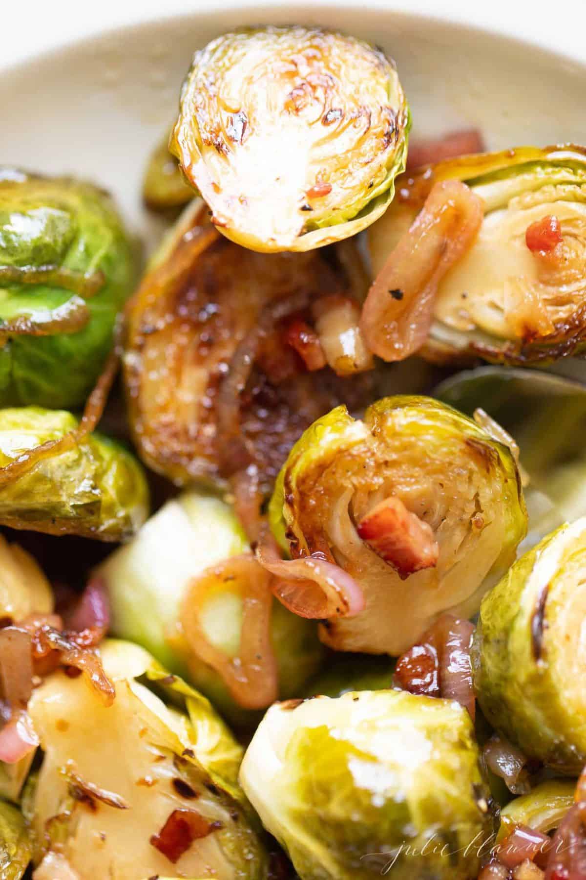 Close-up of sauteed brussels sprouts, pancetta and shallots.