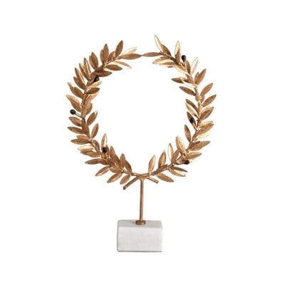 A gold laurel wreath adorning a marble base.