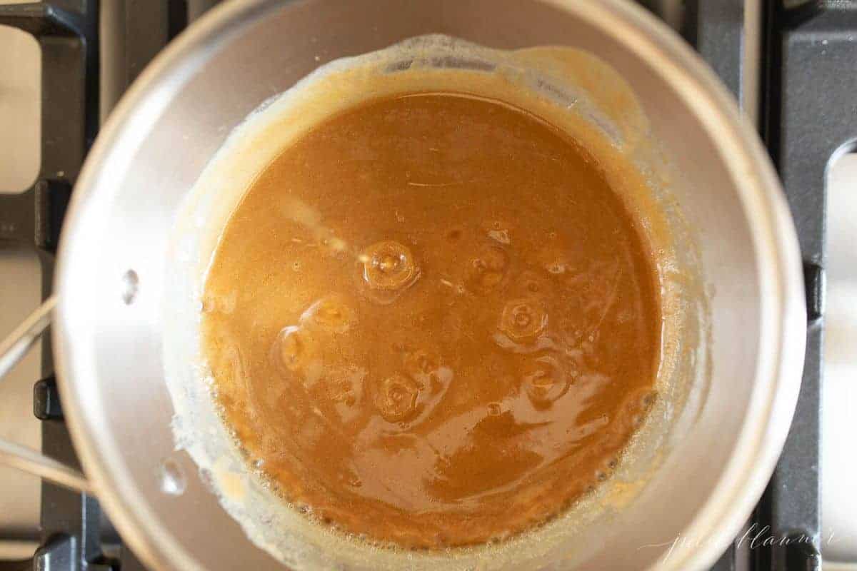 melted peanut butter and butter in a saucepan on the range.