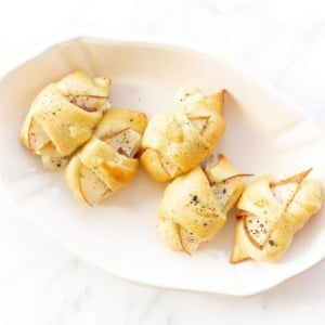 crescent roll appetizer in an ironstone dish