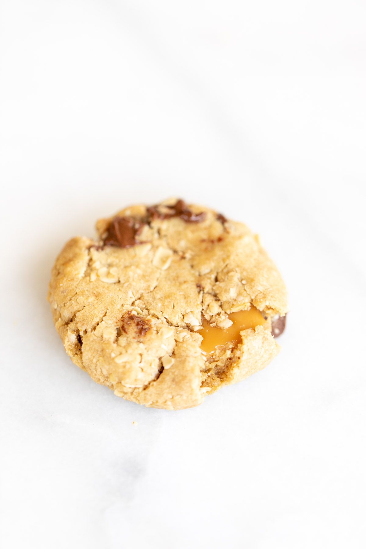 A carmelita cookie on a white marble surface.