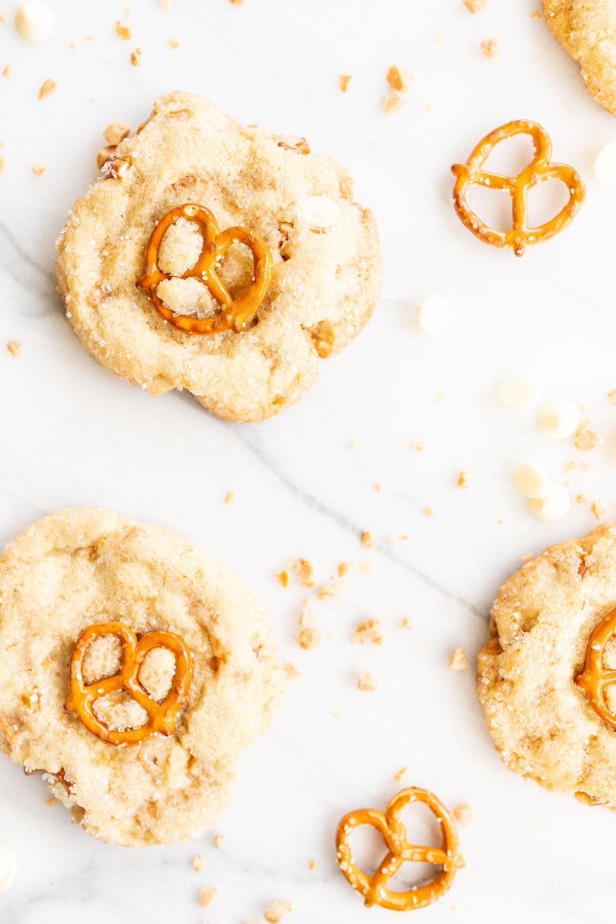 Kitchen sink cookies with pretzels, white chocolate and toffee on a marble countertop