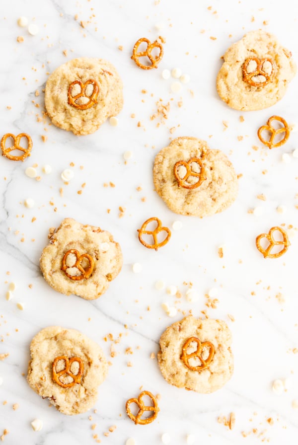 Kitchen sink cookies with pretzels, white chocolate and toffee on a marble countertop