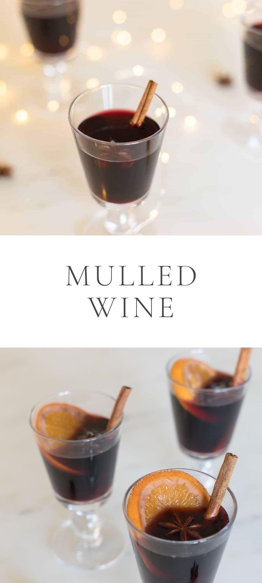 Mulled Wine with cinnamon sticks and orange slices in clear glasses