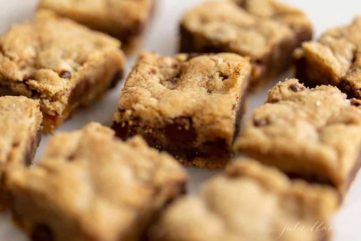 Close up shot of chocolate chip cookie bars with salted caramel.