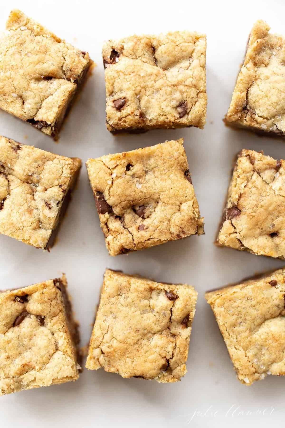 Close up shot of chocolate chip cookie bars with salted caramel.