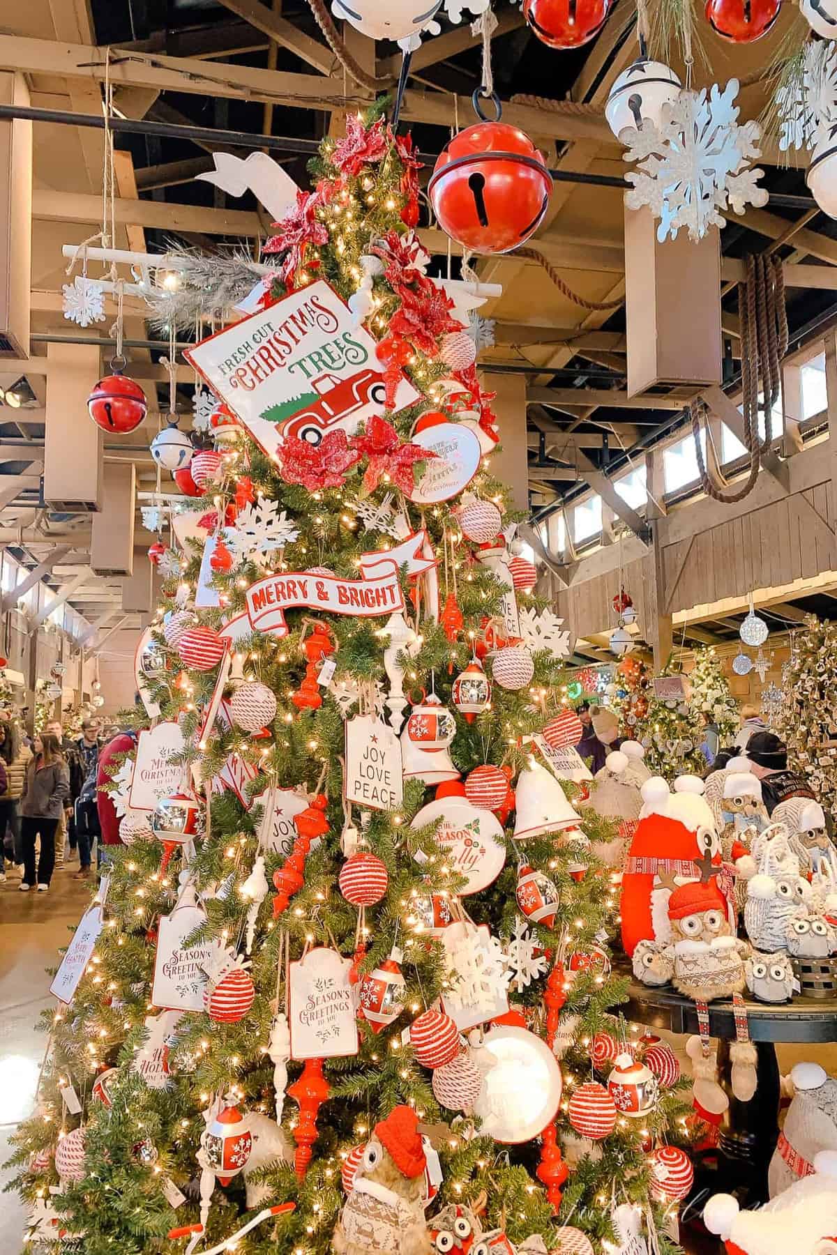 farmhouse christmas tree filled with signs