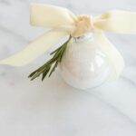 A clear ornament filled with homemade bath salts