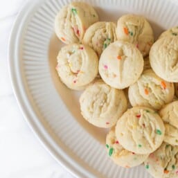 funfetti cookies on white platter