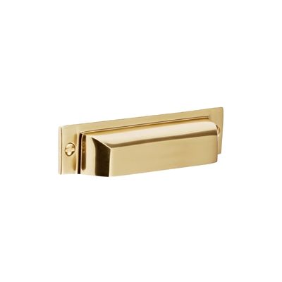 Unlacquered brass mission style cup pull for cabinets.
