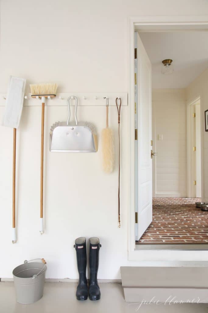 Looking into a brick entryway organizer from garage