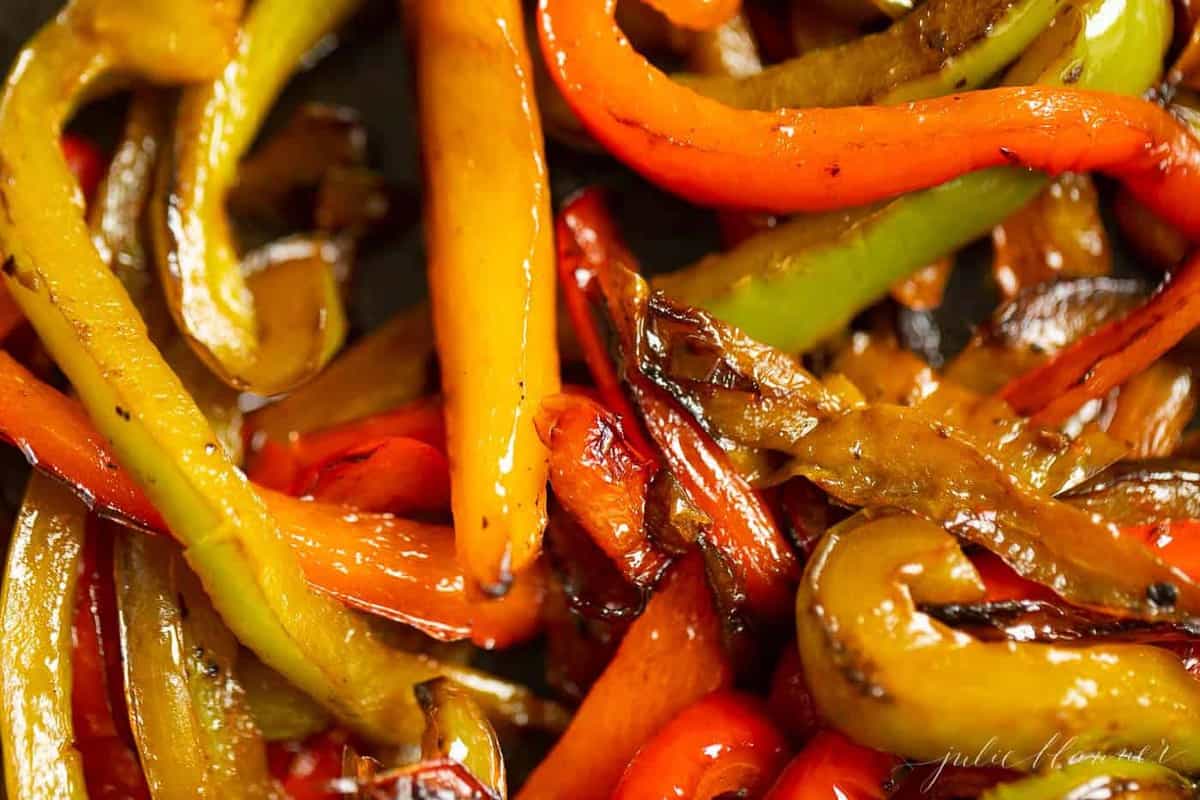 A close up shot of colorful sauteed fajita peppers.