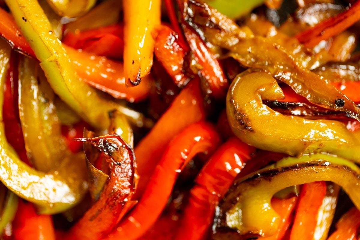 A close up of sauteed bell peppers