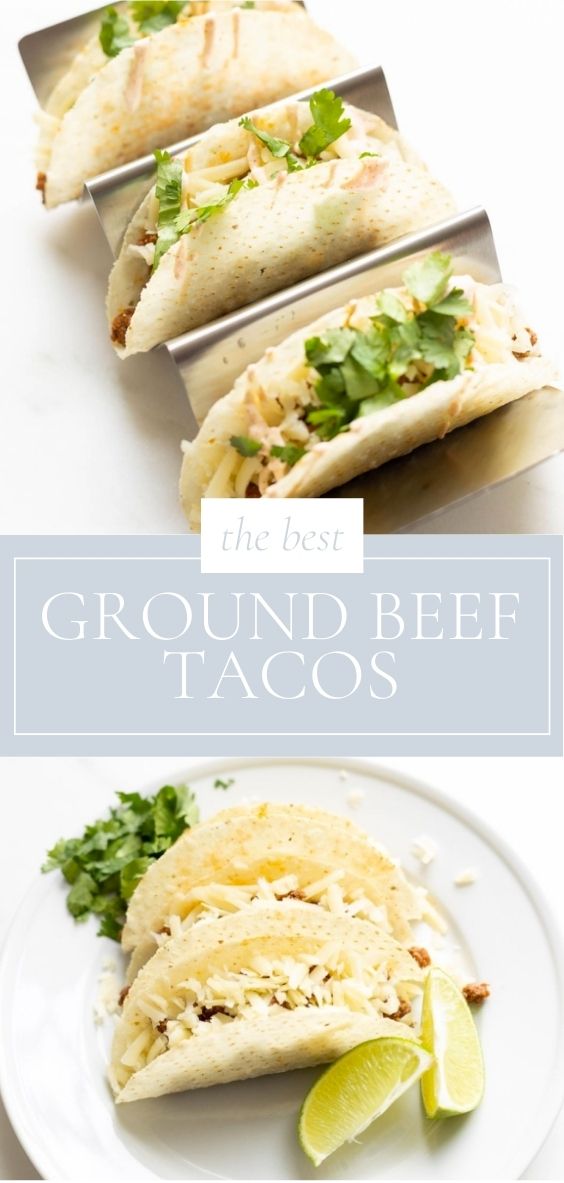 The best ground beef tacos are pictured on a marble counter on a white plate and a metal taco holder.