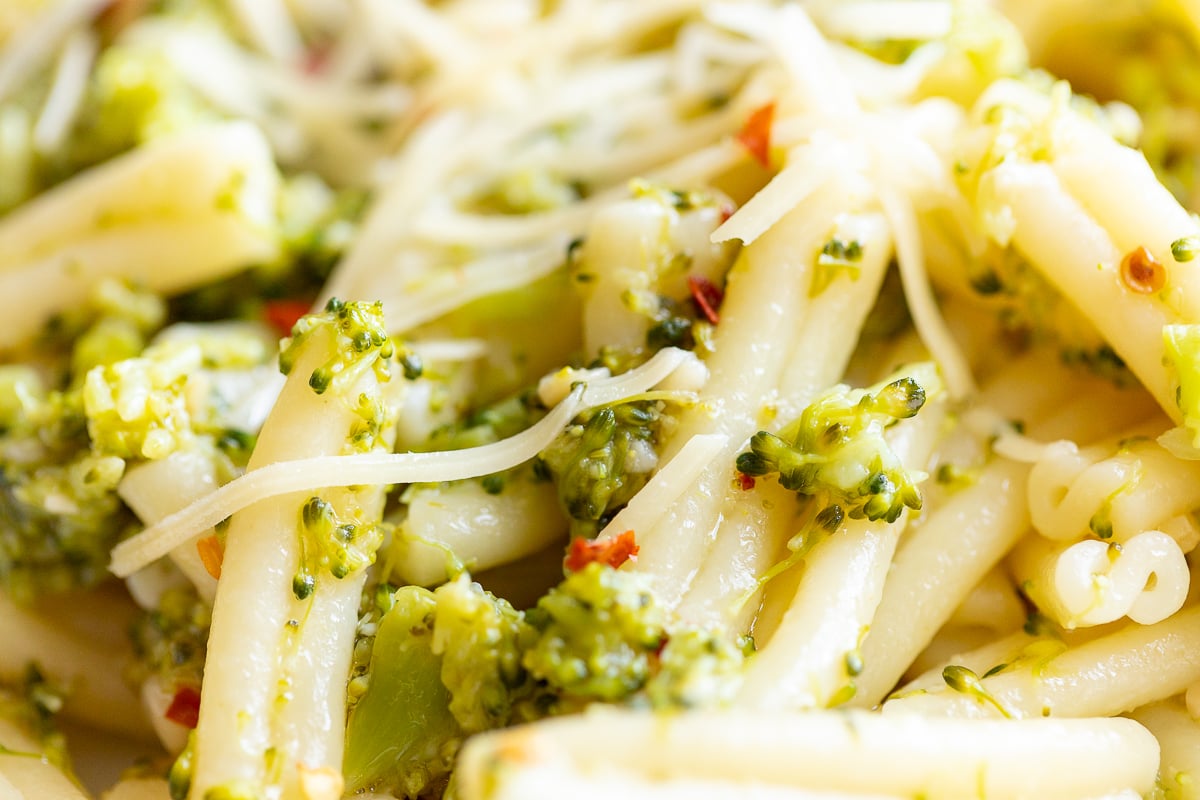 A close up of broccoli pasta.