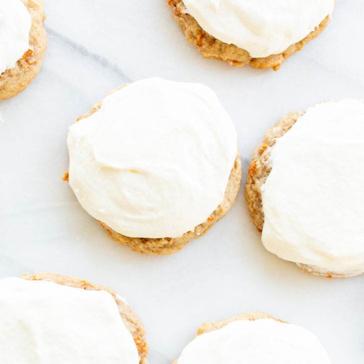 Carrot cake cookies topped with cream cheese frosting.