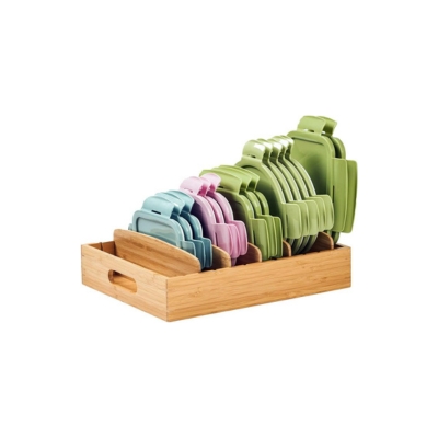 A wooden tray serving as a drawer organizer filled with different colored utensils.