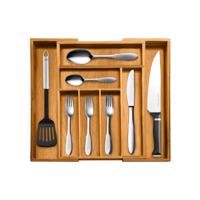 A wooden utensil tray with kitchen drawer dividers and silverware.