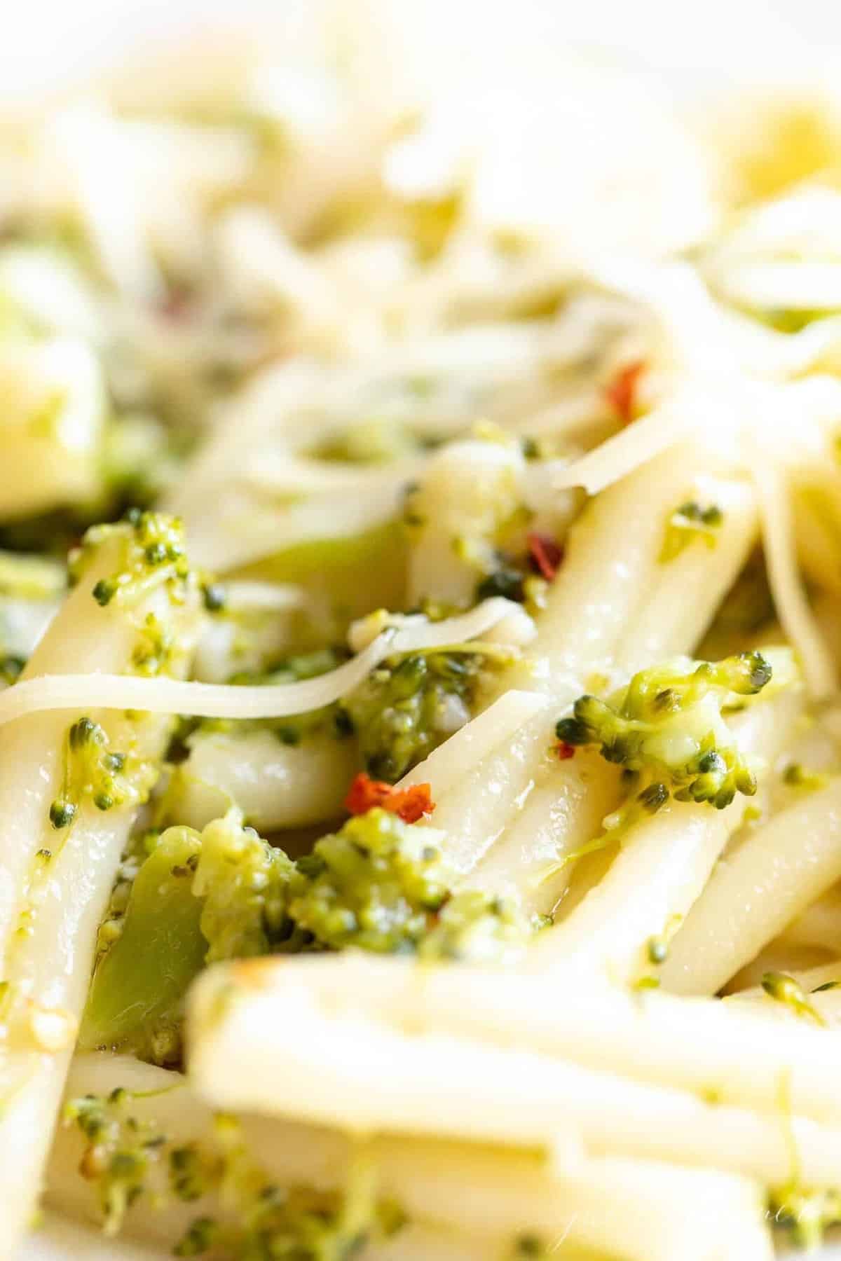 Close up of cheesy broccoli sauce with pasta
