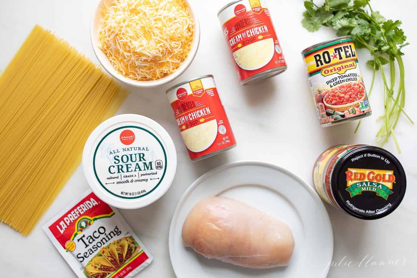 An array of ingredients laid out for Mexican spaghetti.