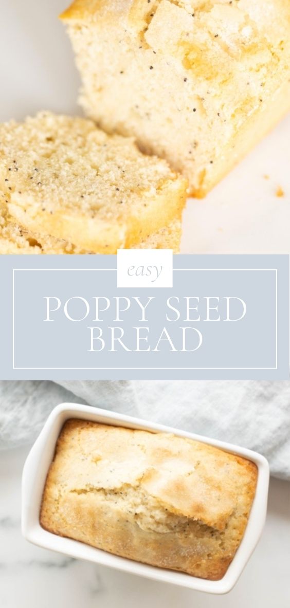 On a marble counter next to a grey napkin, there is a loaf of poppy bread in a white baking pan.
