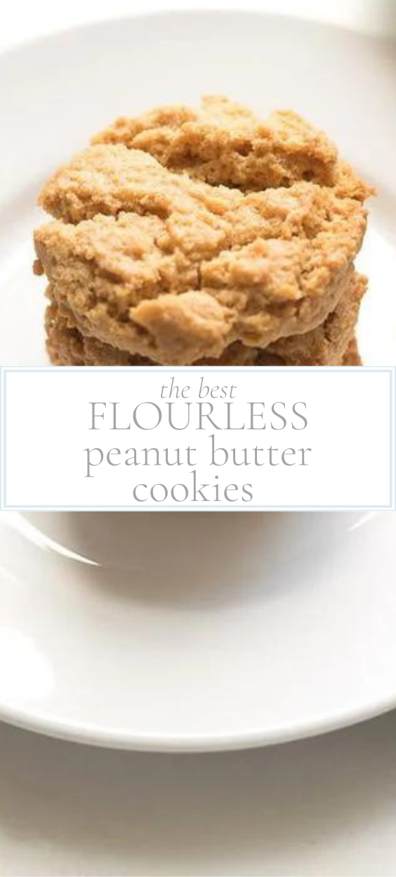 stack of flourless peanut butter cookies on a white plate