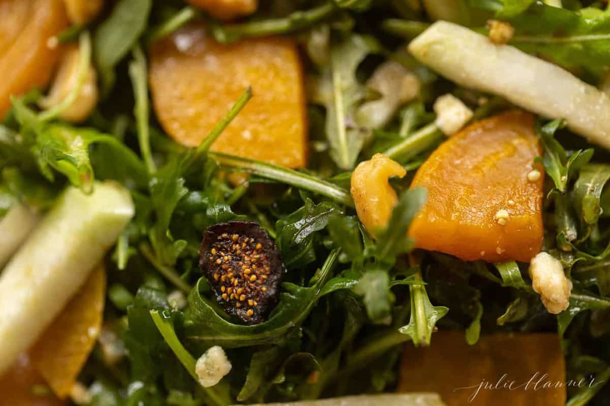 Close up of a beet salad recipe with sliced jicama and golden beets.
