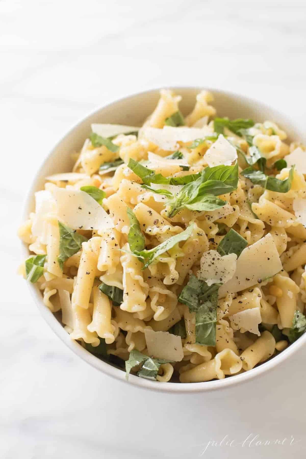 A white bowl filled with the best pasta salad recipe