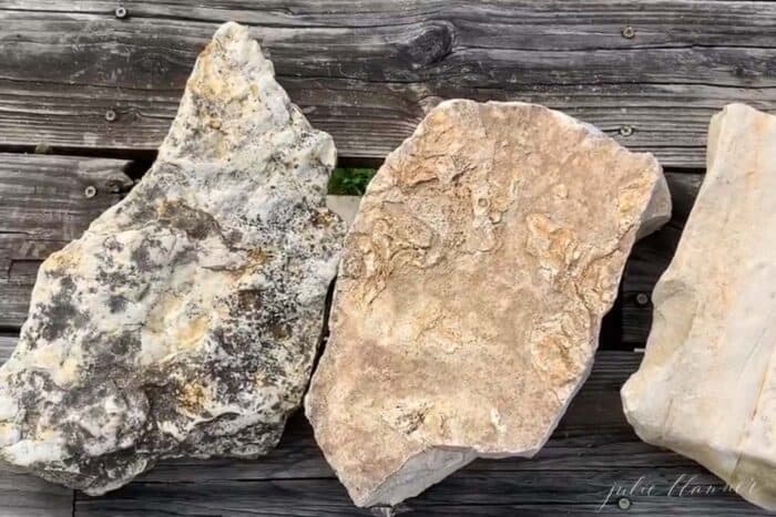 rocks covering hole in wood deck