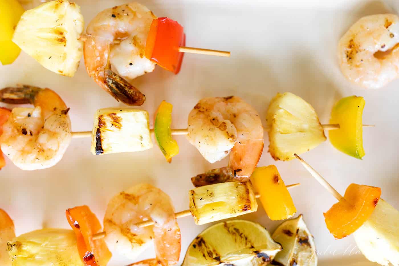 Grilled pineapple shrimp recipe on bamboo skewers.