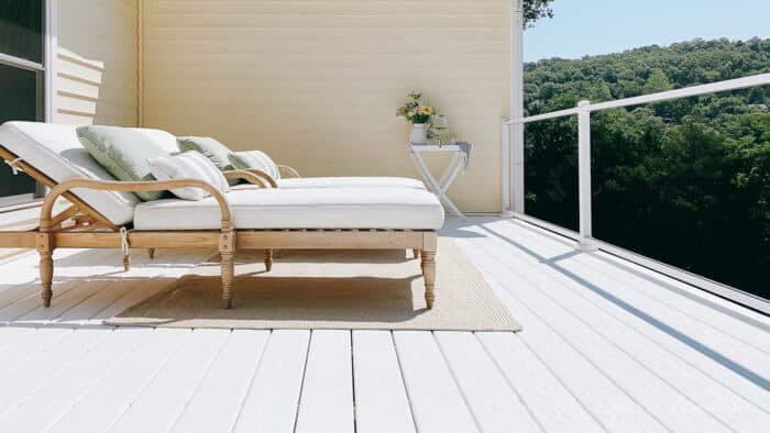 2 chaise lounges on white vinyl deck