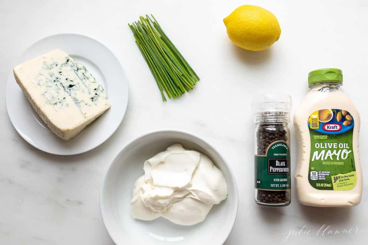 blue cheese dip ingredients on marble surface