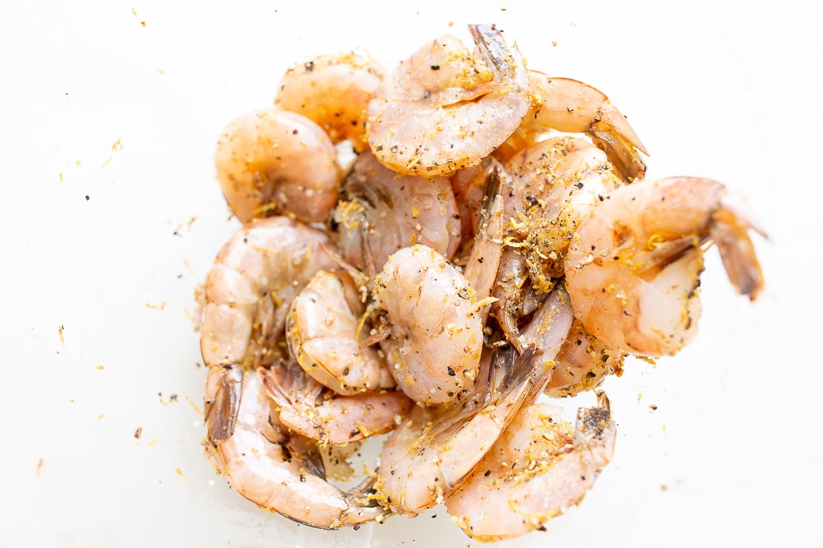 Raw shrimp on a white countertop