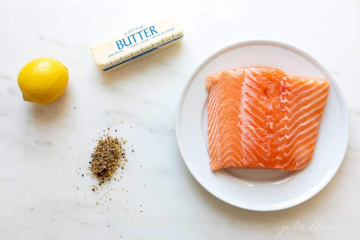 Fresh ingredients for lemon pepper salmon.