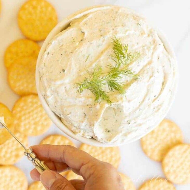 boursin cheese surrounded by crackers