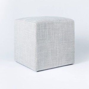 A striped fabric cube from the Studio McGee line at Target