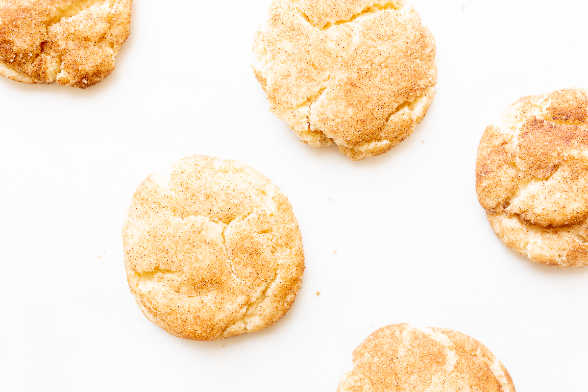 snickerdoodle cookies on a white countertop.